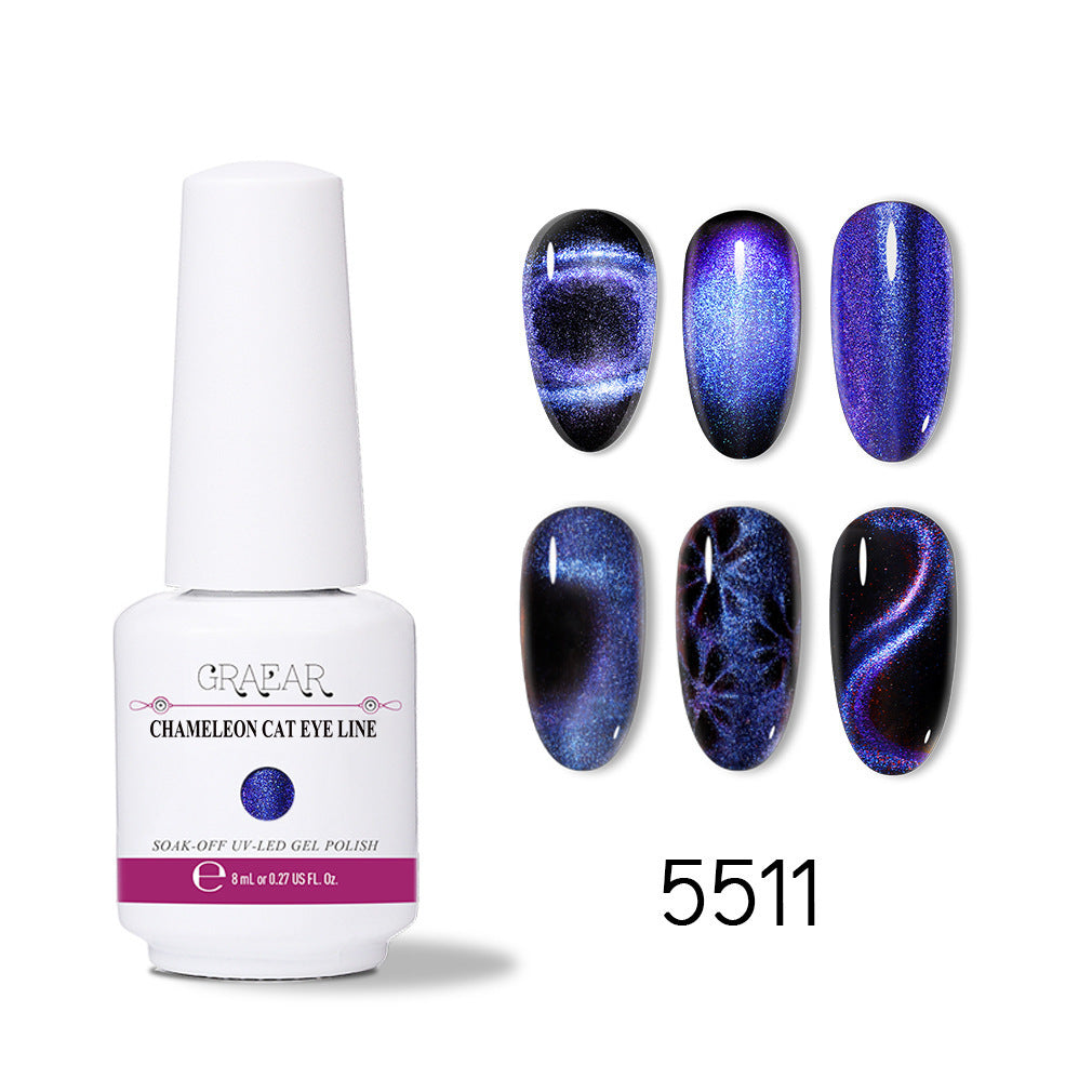 Chameleon cat eye gel polish bottle with six blue and purple magnetic nail art designs