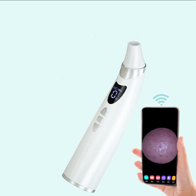 White electric blackhead remover with digital display showing suction levels and smartphone with skin magnification view