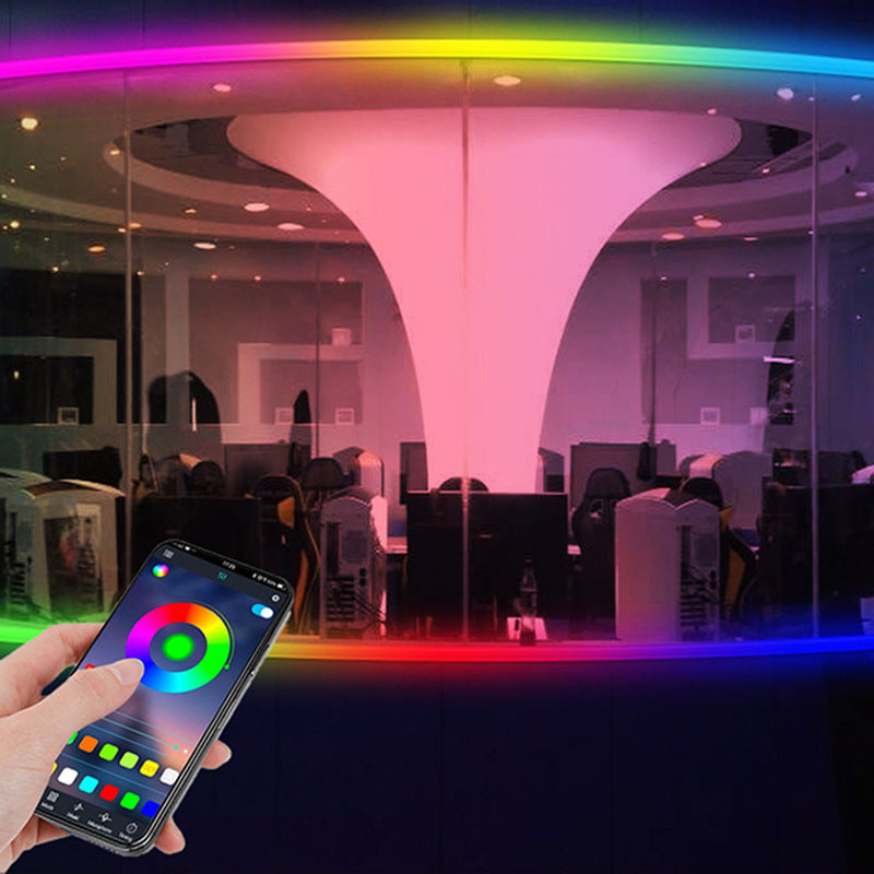RGB LED strip lights for room controlled by smartphone app with color wheel and brightness settings